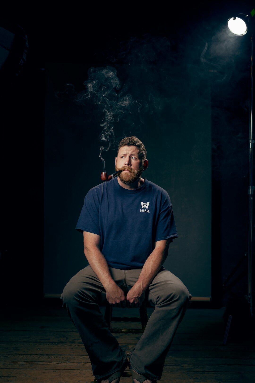 Studio portrait of a middle-aged male documentary film professor